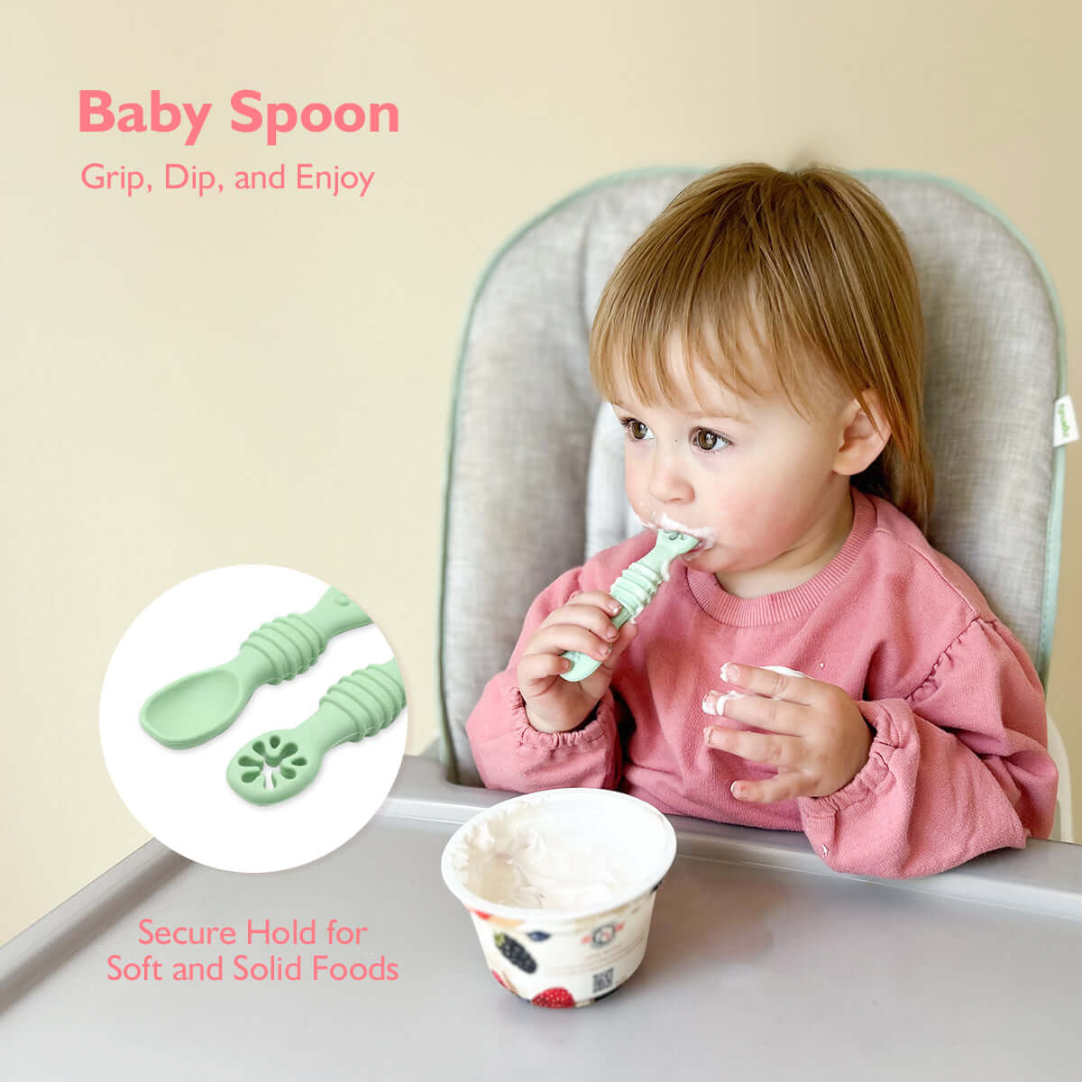 A baby eating with a MomMed baby spoon