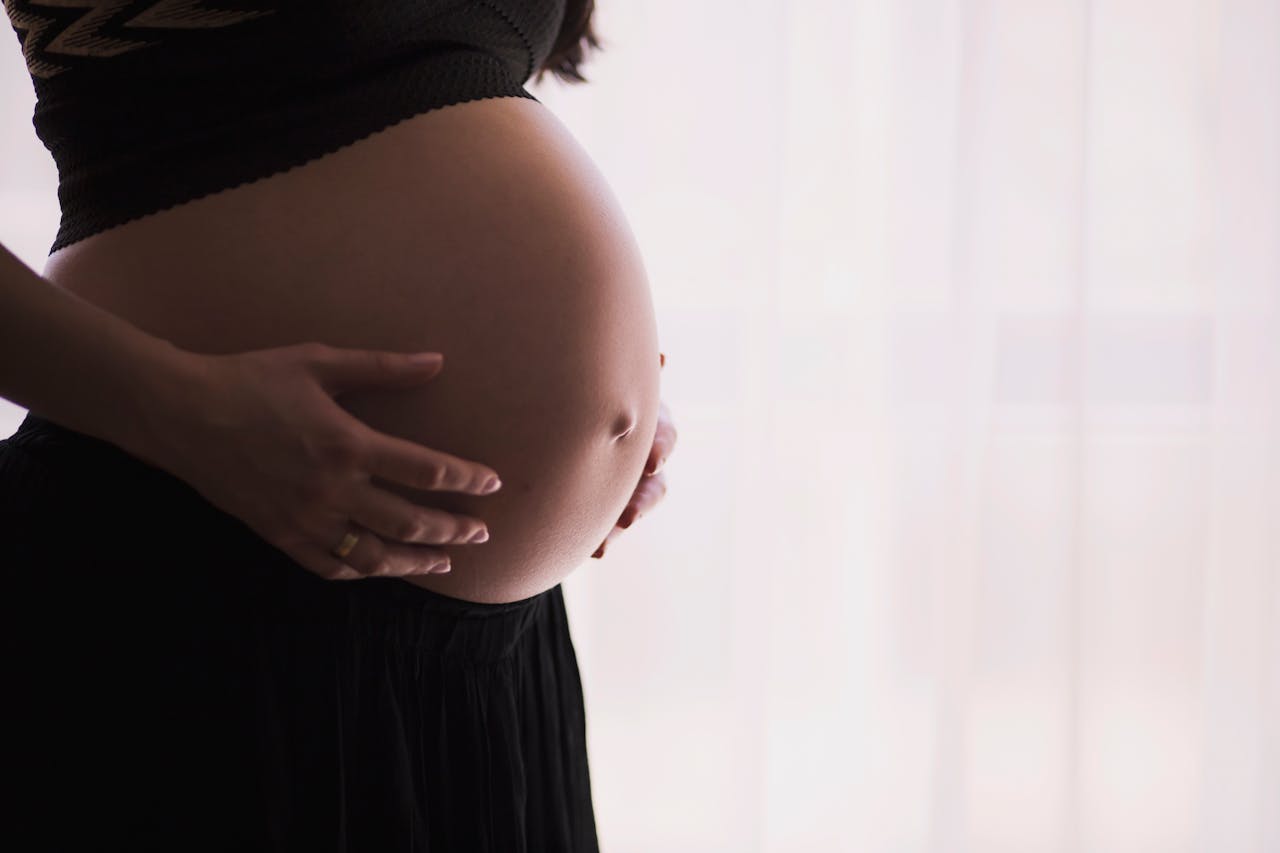Third-Trimester Discomforts: Solutions for Back Pain, Swelling, and Sleep Issues