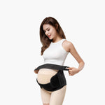 A pregnant woman is shown from the side while using the MomMed maternity belly band